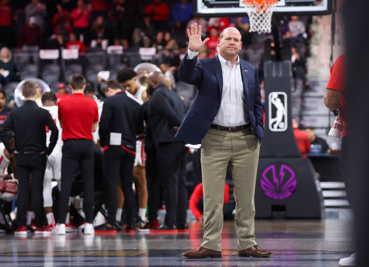 New UNLV football coach Barry Odom is introduced during the first half of a basketball game aga ...