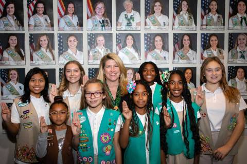 Girl Scouts of Southern Nevada CEO Kimberly Trueba, back center, poses for a photo with Girl Sc ...