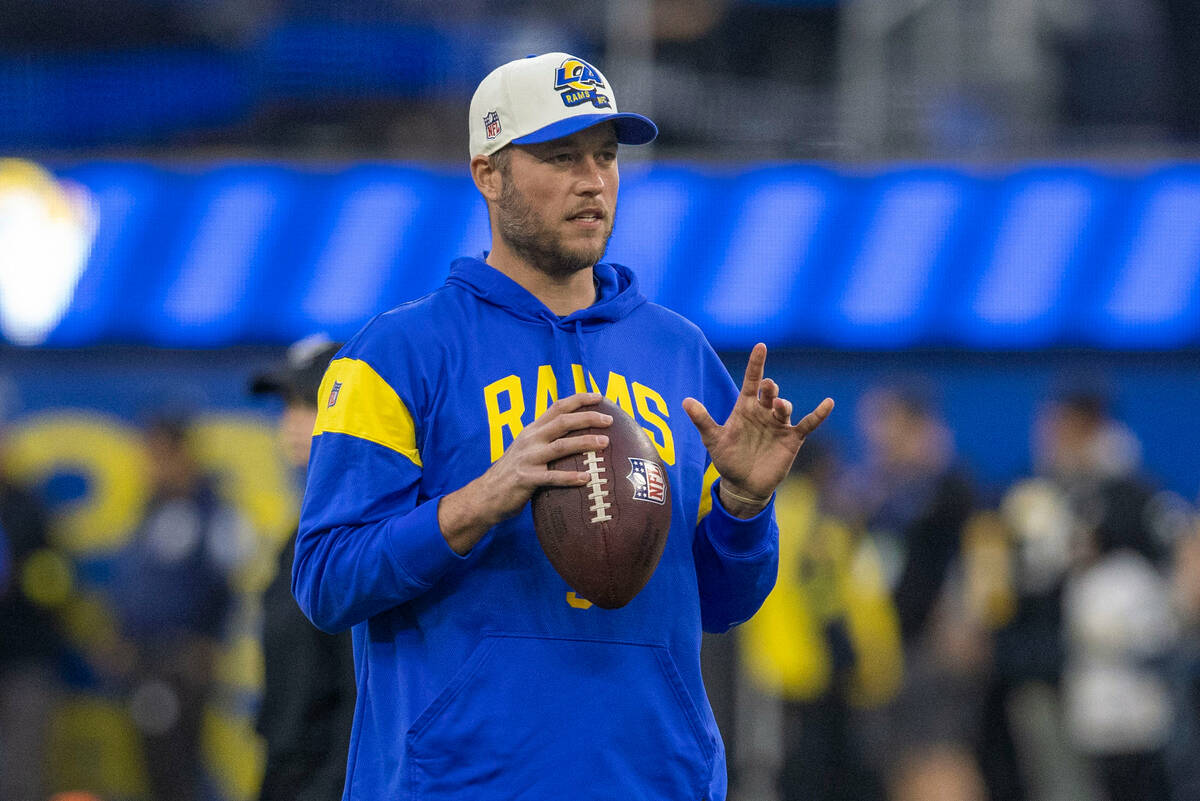 Los Angeles Rams quarterback Matthew Stafford on the field before an NFL game against the Raide ...