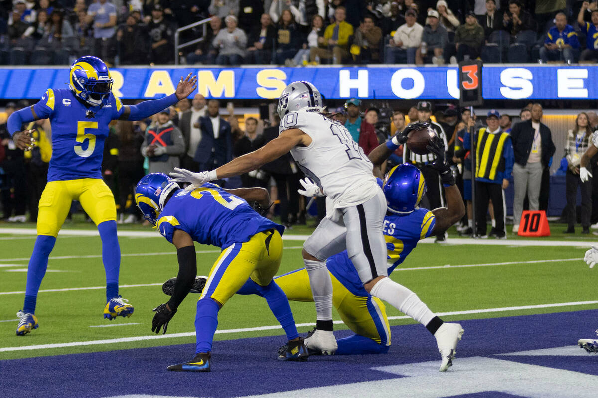 Los Angeles Rams linebacker Ernest Jones (53) intercepts Raiders quarterback Derek Carr (4), no ...