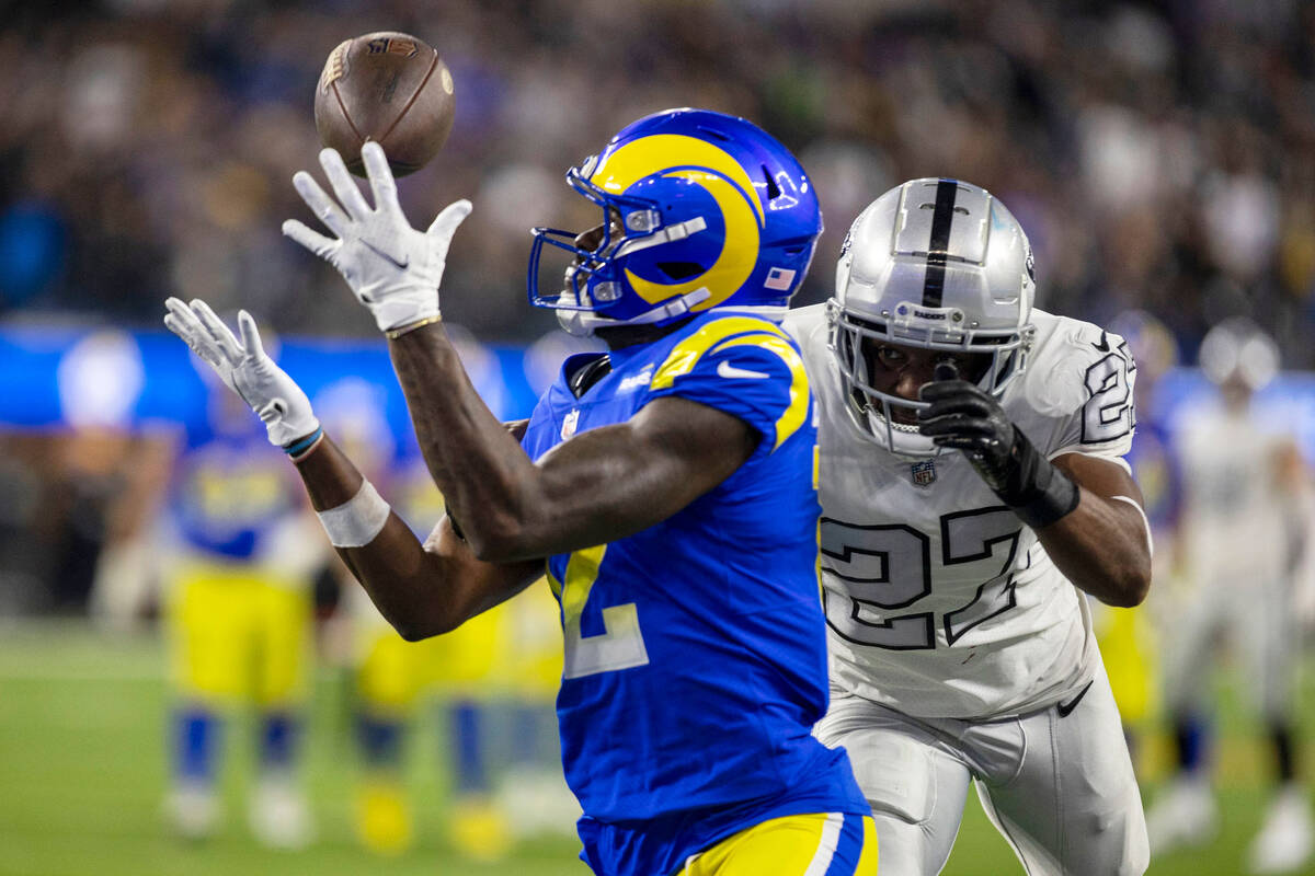 Los Angeles Rams wide receiver Van Jefferson (12) scores the game-tying touchdown over Raiders ...