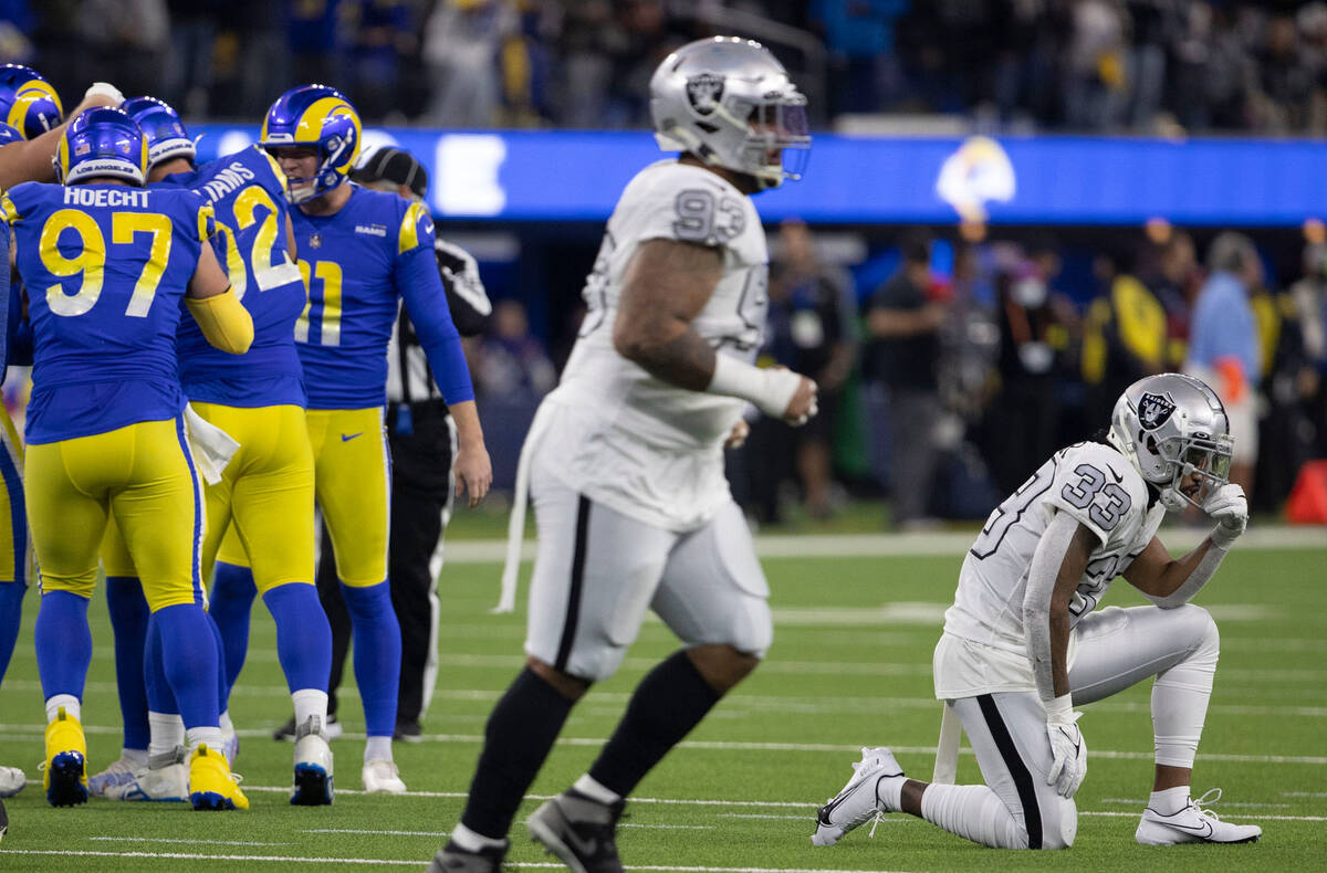 Raiders safety Roderic Teamer (33) hangs his head after the against the Los Angeles Rams kicked ...