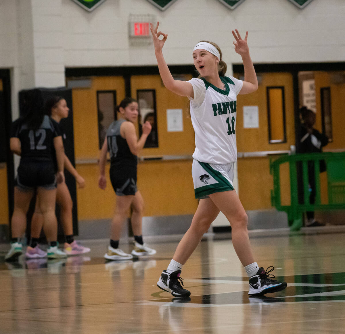 Palo Verde’s Reagan Nehls (10) celebrates another teammate’s three-pointer during ...