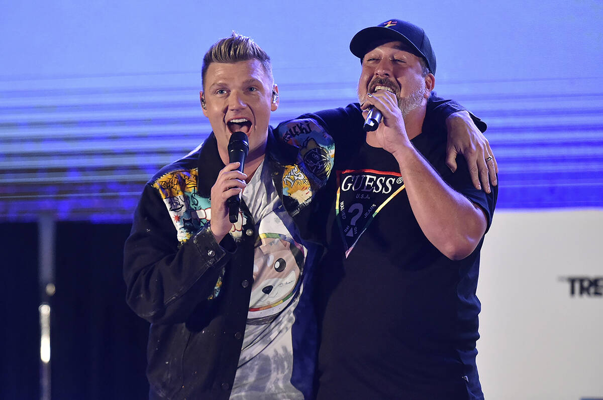 Nick Carter, left, and Joey Fatone perform at Bingo Under the Stars on Friday, June 18, 2021, a ...