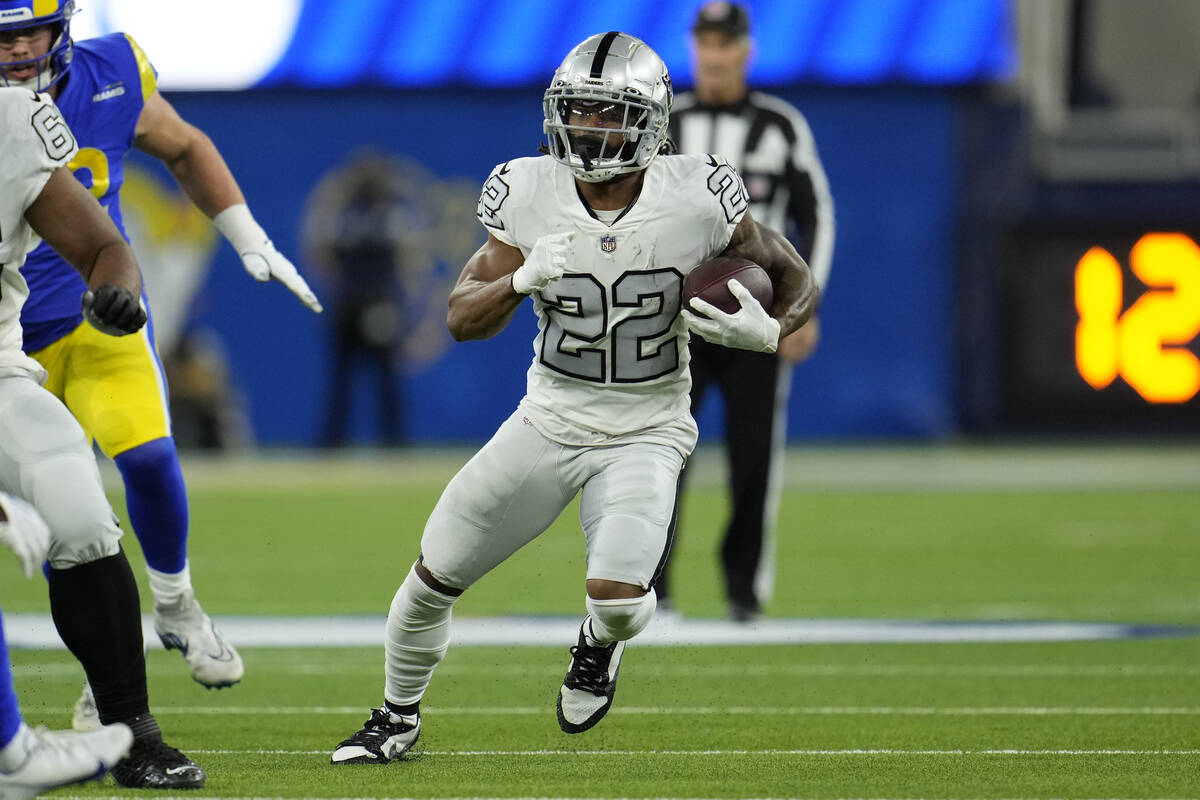 Las Vegas Raiders running back Ameer Abdullah runs with the ball during the first half of an NF ...
