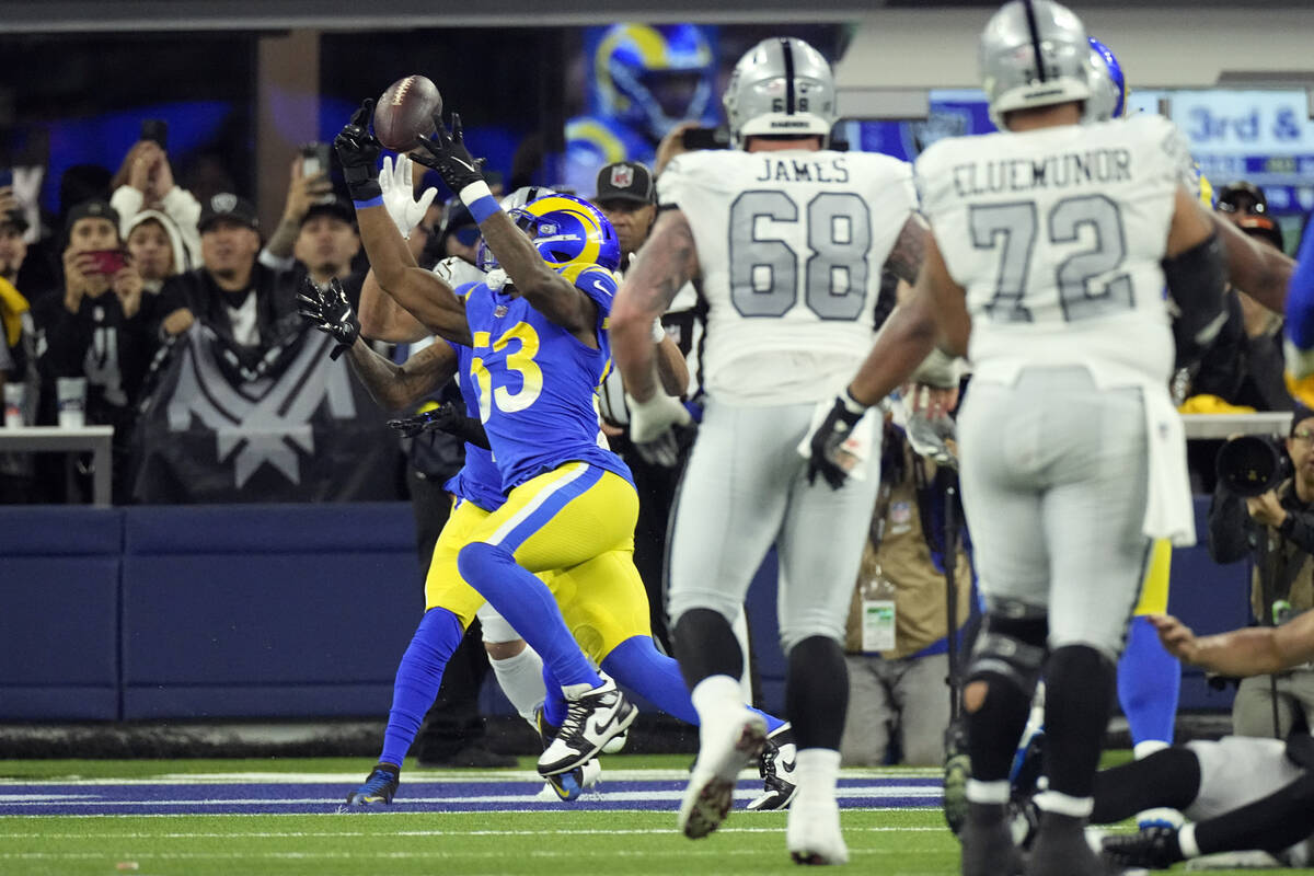 Los Angeles Rams linebacker Ernest Jones (53) makes an interception in the end zone during the ...