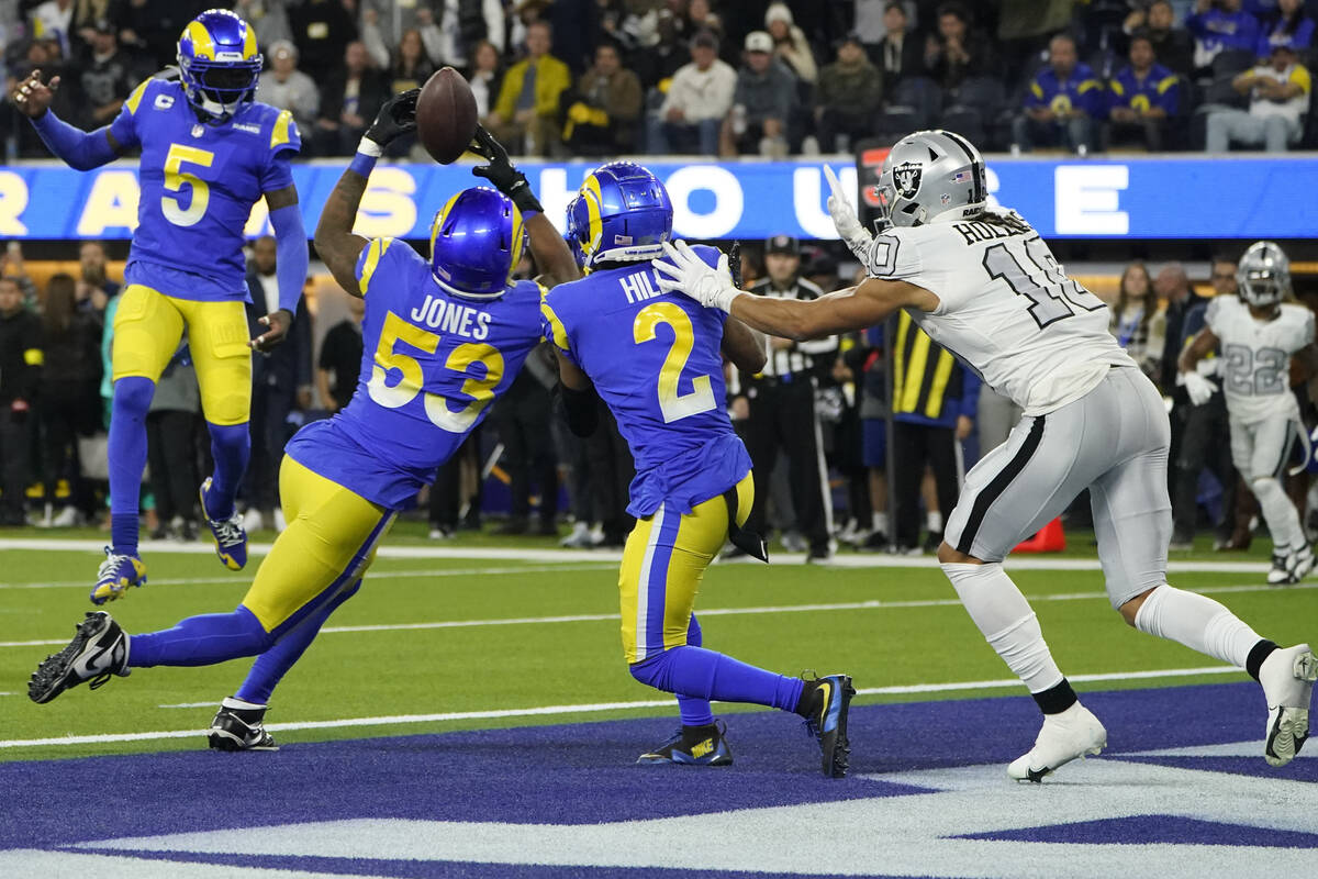 Los Angeles Rams linebacker Ernest Jones (53) makes an interception in the end zone during the ...