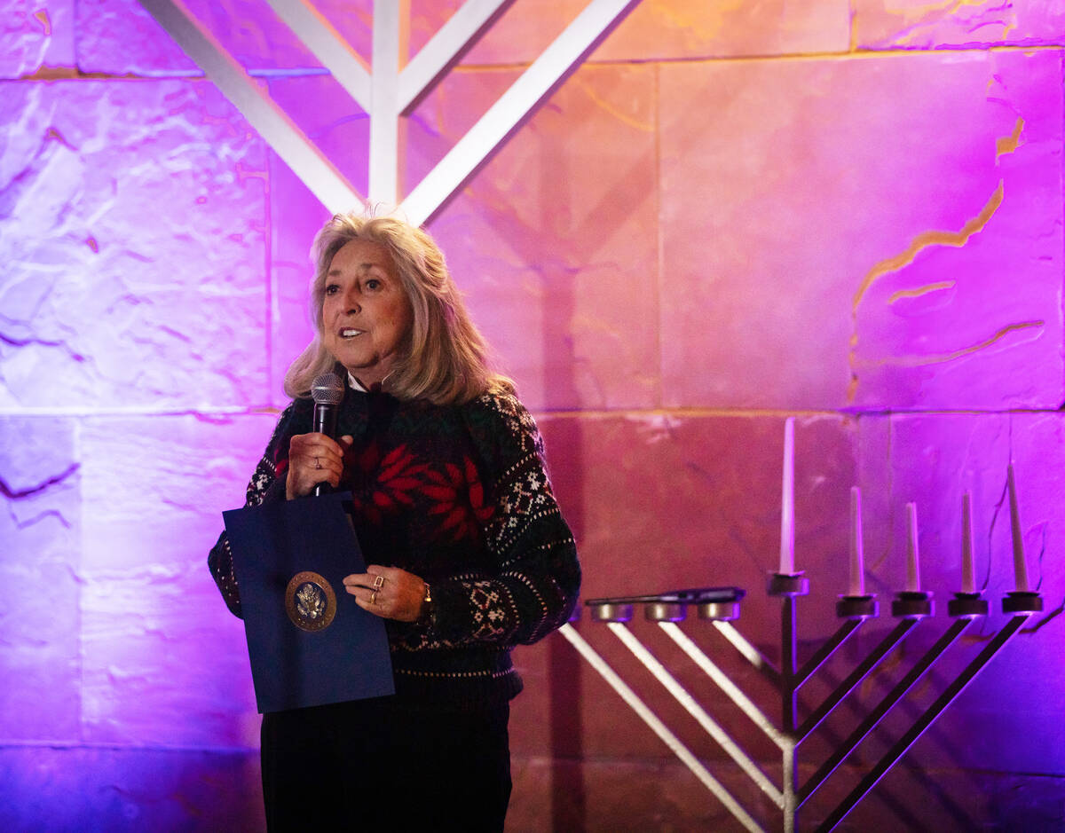 Congresswoman Dina Titus speaks during a menorah lighting in the rotunda of the government cent ...