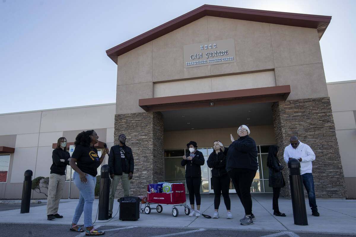 A group chants in support of prisoners' rights during a news conference outside the Nevada Depa ...