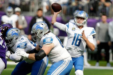 Detroit Lions quarterback Jared Goff (16) throws a pass during the first half of an NFL footbal ...