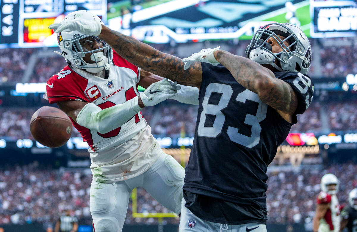 Arizona Cardinals safety Jalen Thompson (34) knocks away a touchdown pass in the end zone to Ra ...