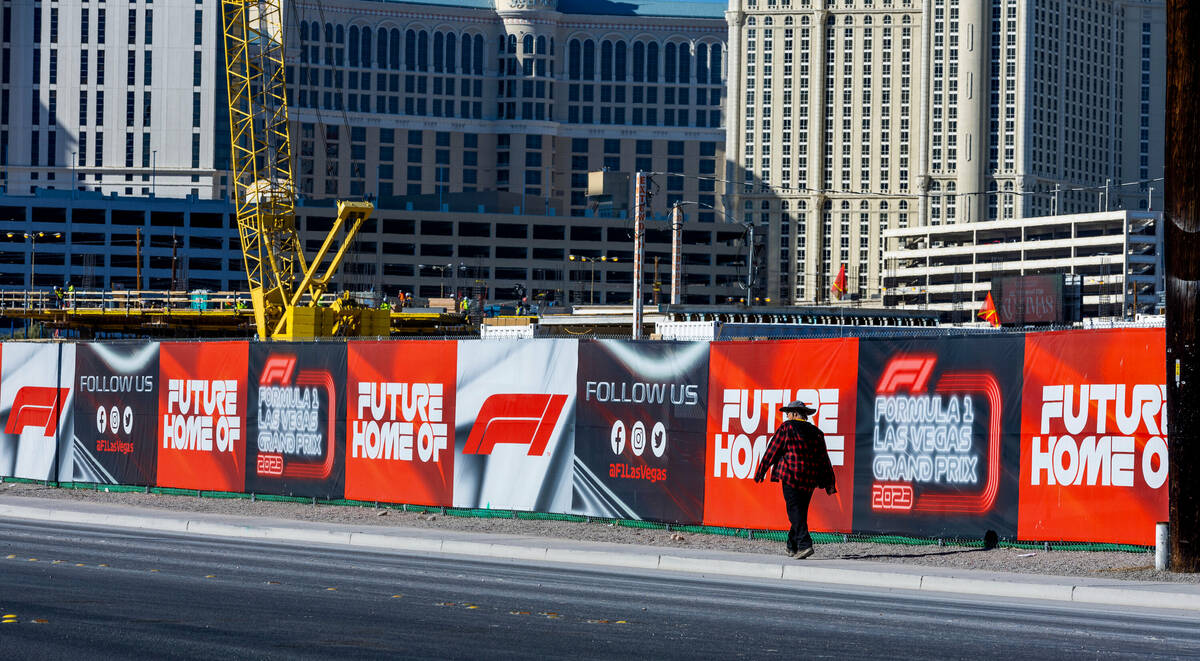 Construction on current Formula One land continues behind a screened fence with advertising alo ...