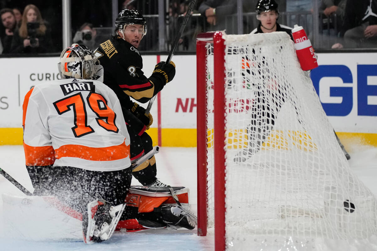 Vegas Golden Knights center Jonathan Marchessault (81) scores against Philadelphia Flyers goalt ...
