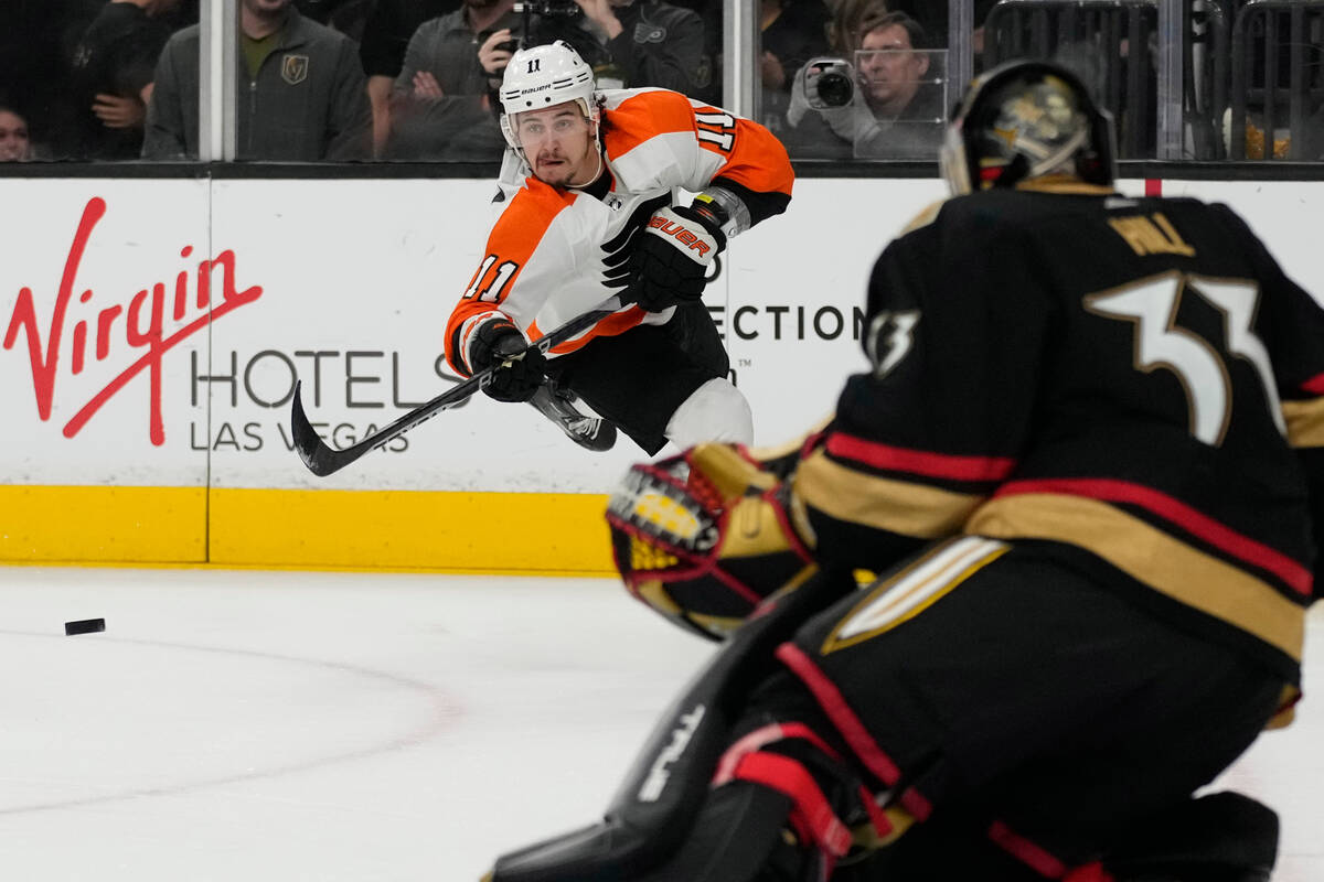 Philadelphia Flyers right wing Travis Konecny (11) attempts a shot on Vegas Golden Knights goal ...