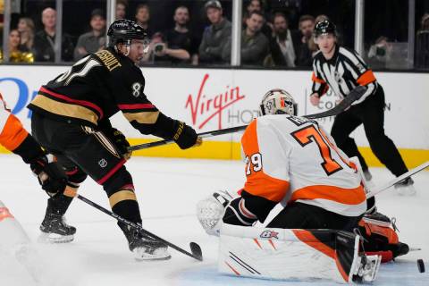 Vegas Golden Knights center Jonathan Marchessault (81) scores against Philadelphia Flyers goalt ...
