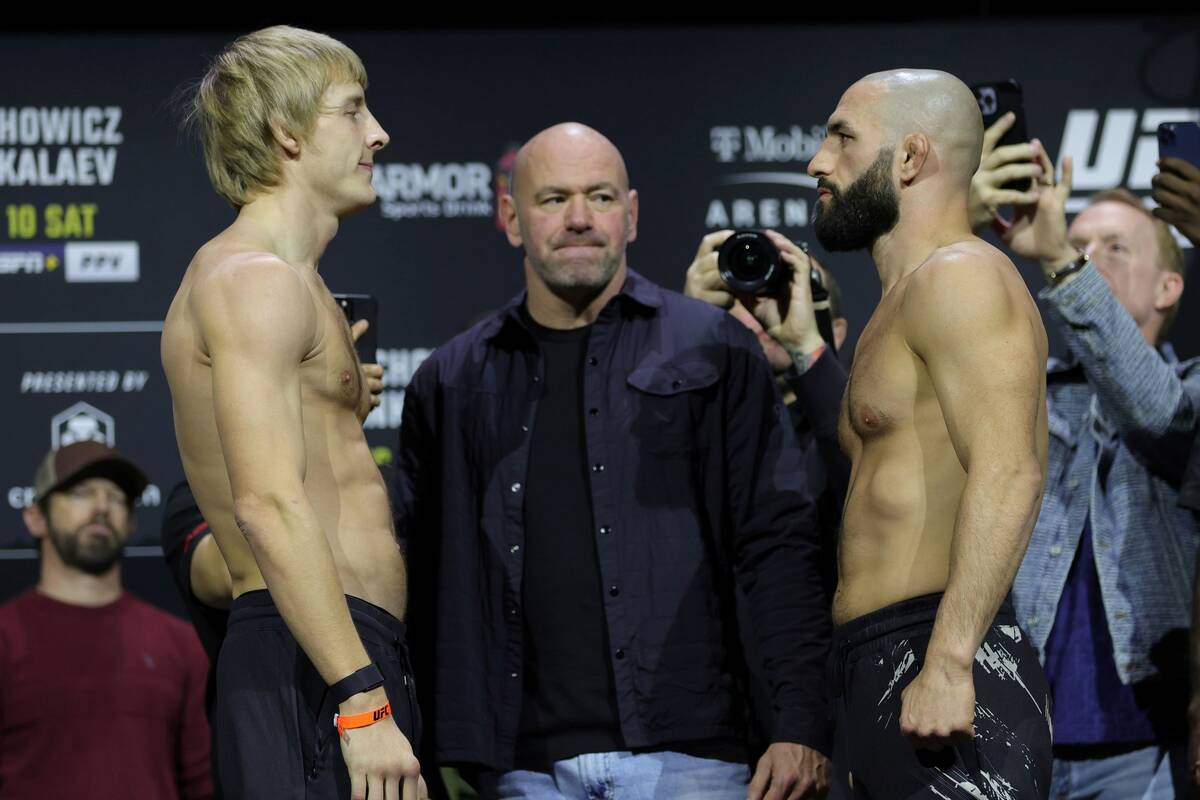 Paddy Pimblett of England, left, and Jared Gordon face off during the UFC 282 ceremonial weigh- ...