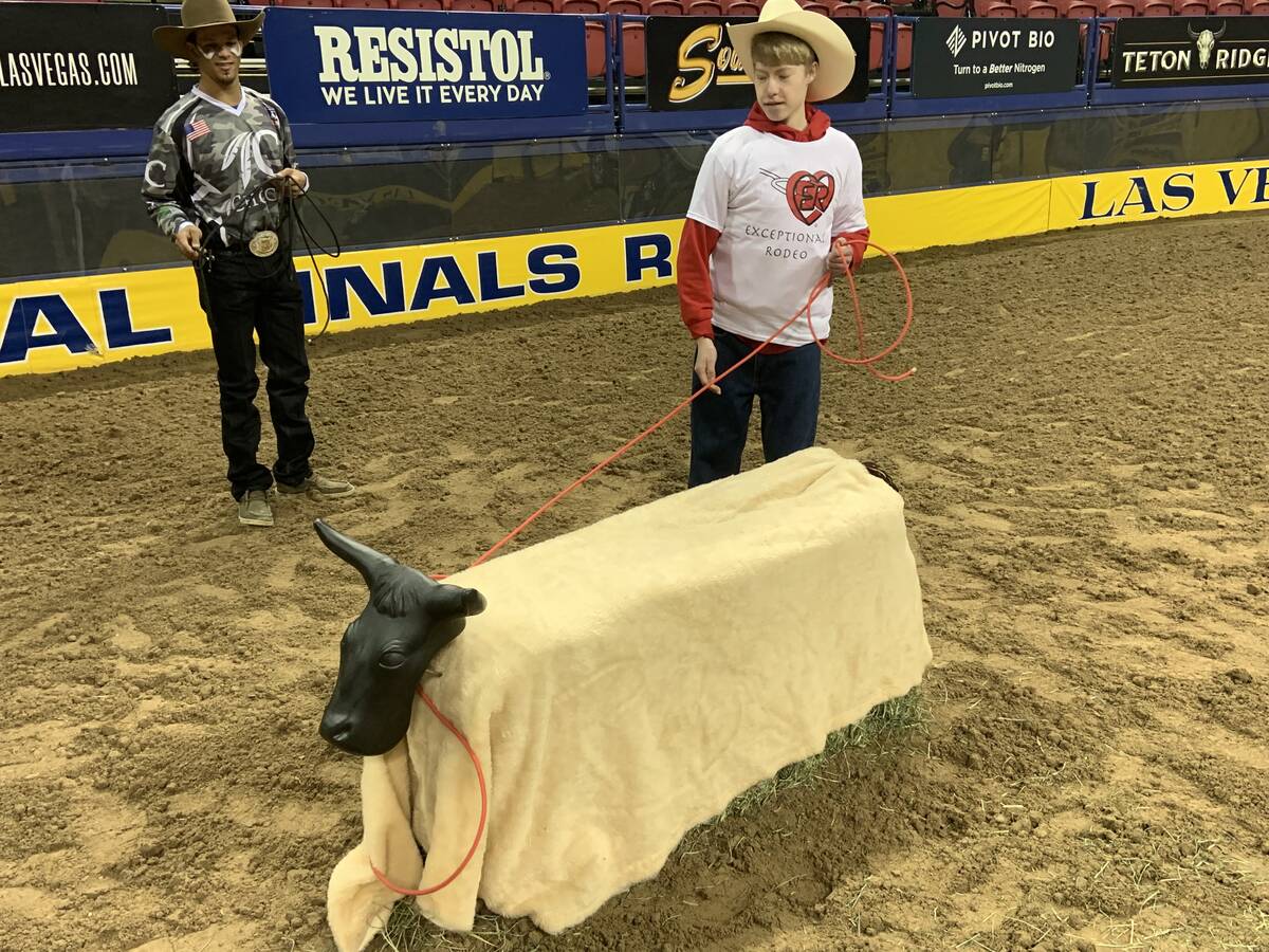 Gavin Jones lassos his practice steer during the Exceptional Rodeo on Thursday morning at the T ...