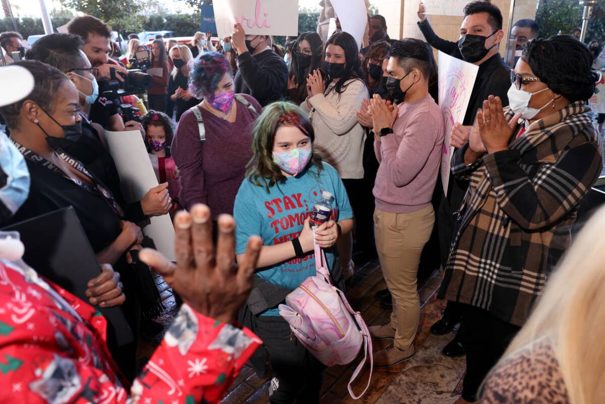 Harli Hecht, 10, who suffers from rare autoimmune conditions, arrives with her mother Brandi He ...