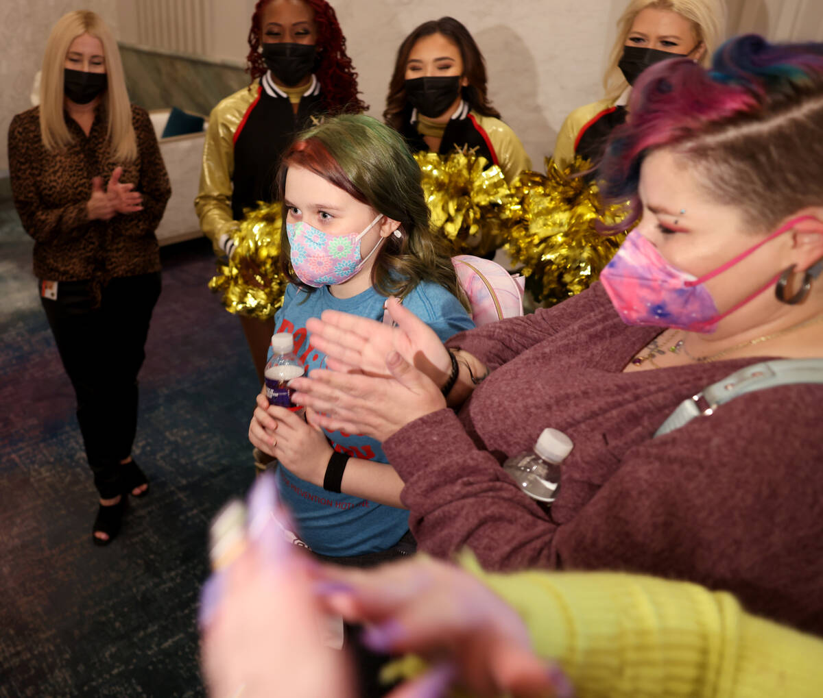 Harli Hecht, 10, who suffers from rare autoimmune conditions, arrives with her mother Brandi He ...