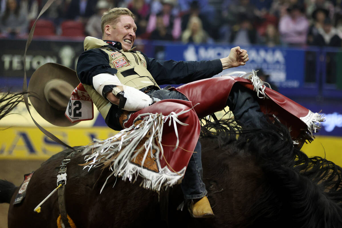 Ty Breuer competes in the bareback riding event during round 10 of the 64th Wrangler National F ...