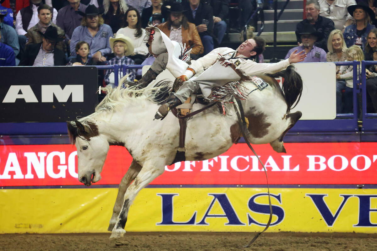 Cole Franks competes in the bareback riding event during round 10 of the 64th Wrangler National ...