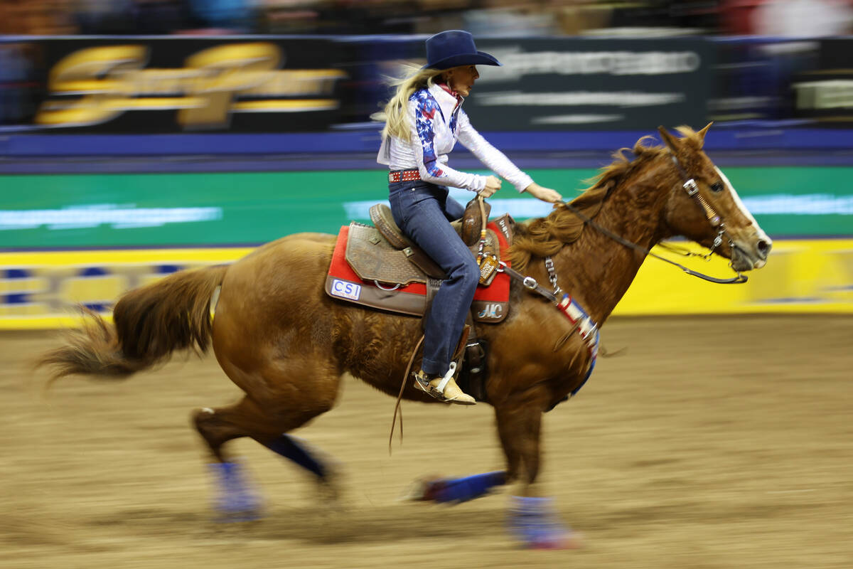 Margo Crowther competes in the barrel racing event during round 10 of the 64th Wrangler Nationa ...