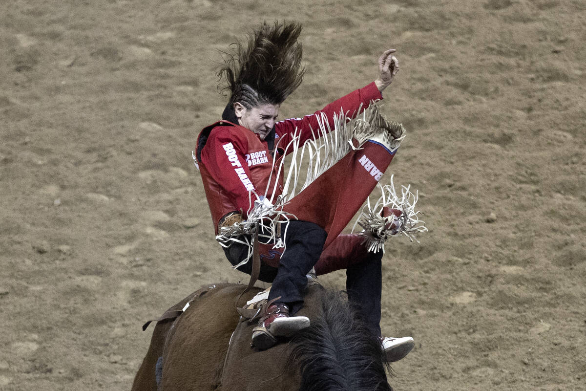 Rocker Steiner, of Weatherford, Tex., competes in bareback riding during the seventh go-round o ...