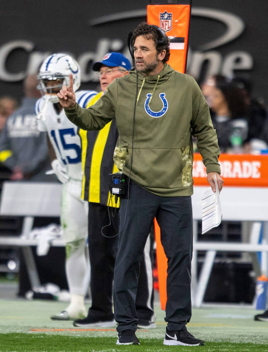 Indianapolis Colts head coach Jeff Saturday communicates to the team from the sideline during t ...