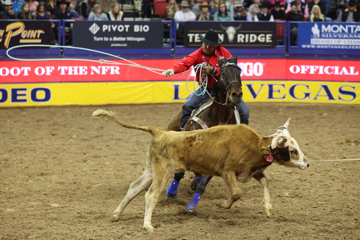 Jonathan Torres competes in the team roping event during round 10 of the 64th Wrangler National ...