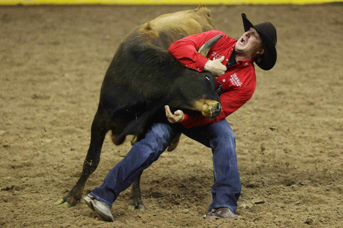 Nick Guy competes in the steer wrestling event during round 10 of the 64th Wrangler National Fi ...