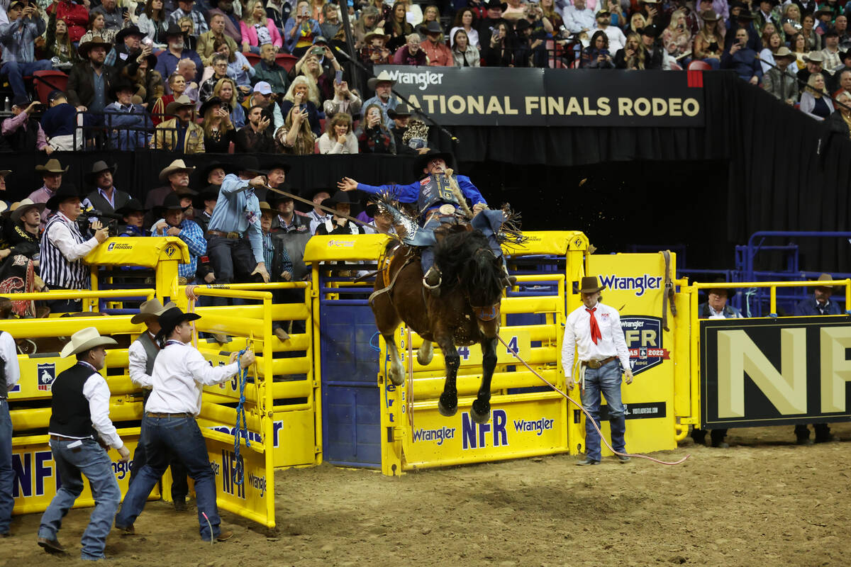 Stetson Wright competes in the saddle bronc riding event during round 10 of the 64th Wrangler N ...