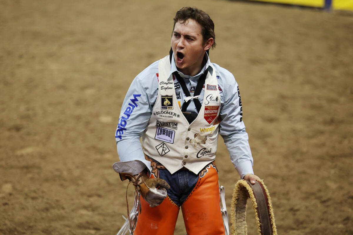Clayton Biglow reacts after his run in the bareback riding event during round 10 of the 64th Wr ...