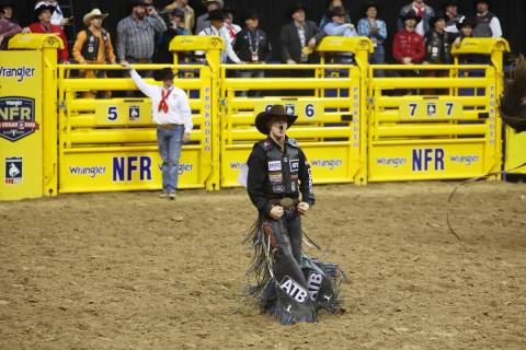 Zeke Thurston reacts after his run in the saddle bronc riding event during round 10 of the 64th ...