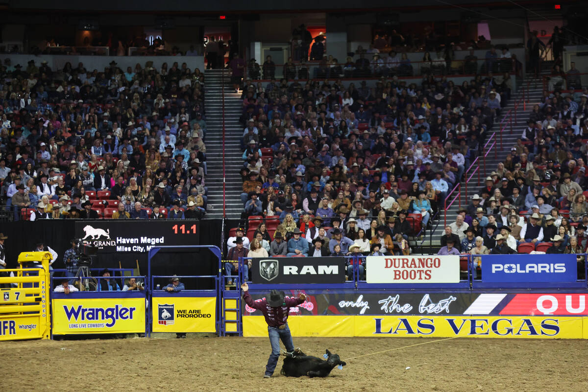 Haven Meged competes in the tie-down roping event during round 10 of the 64th Wrangler National ...