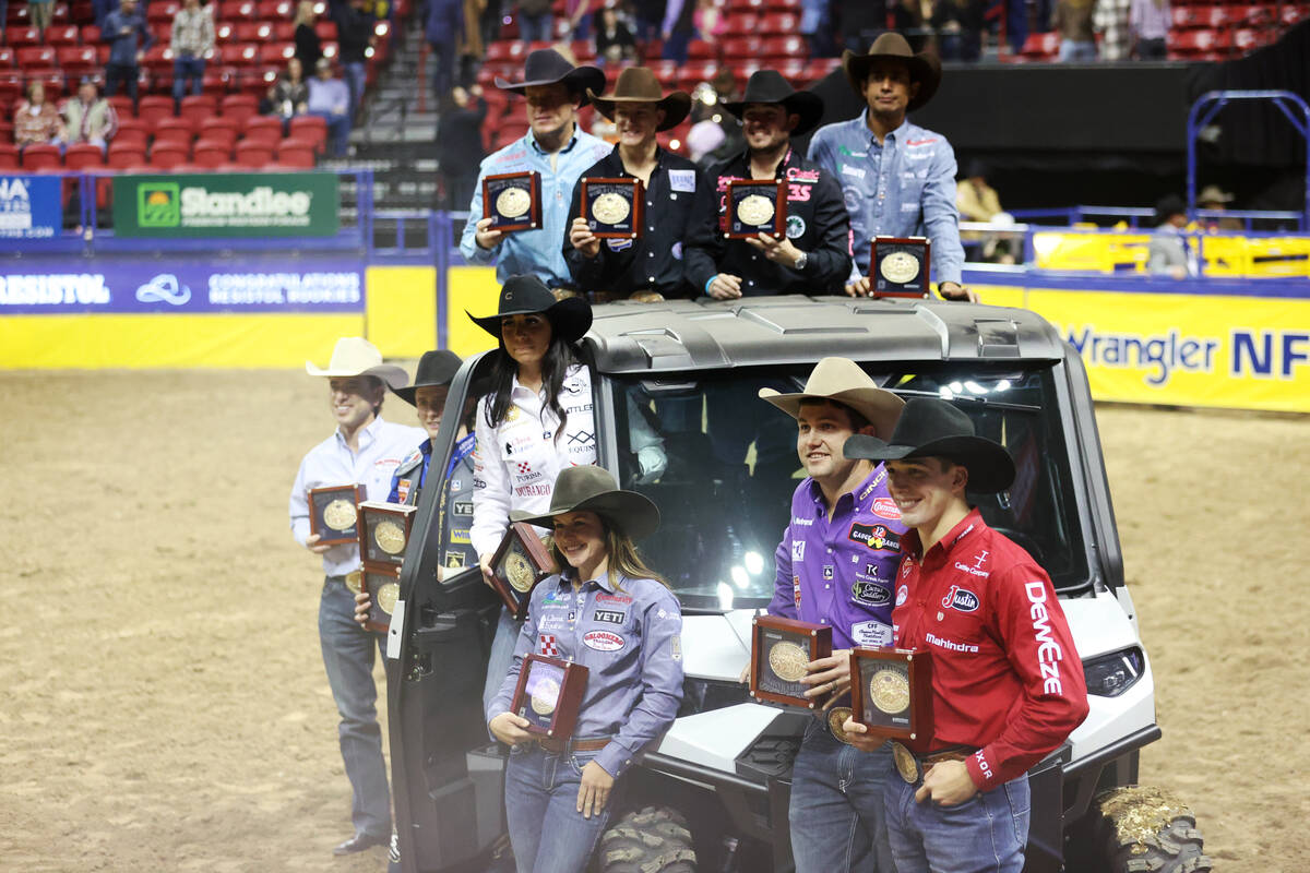 The champions of the 64th Wrangler National Finals Rodeo pose for photos following day 10 of th ...