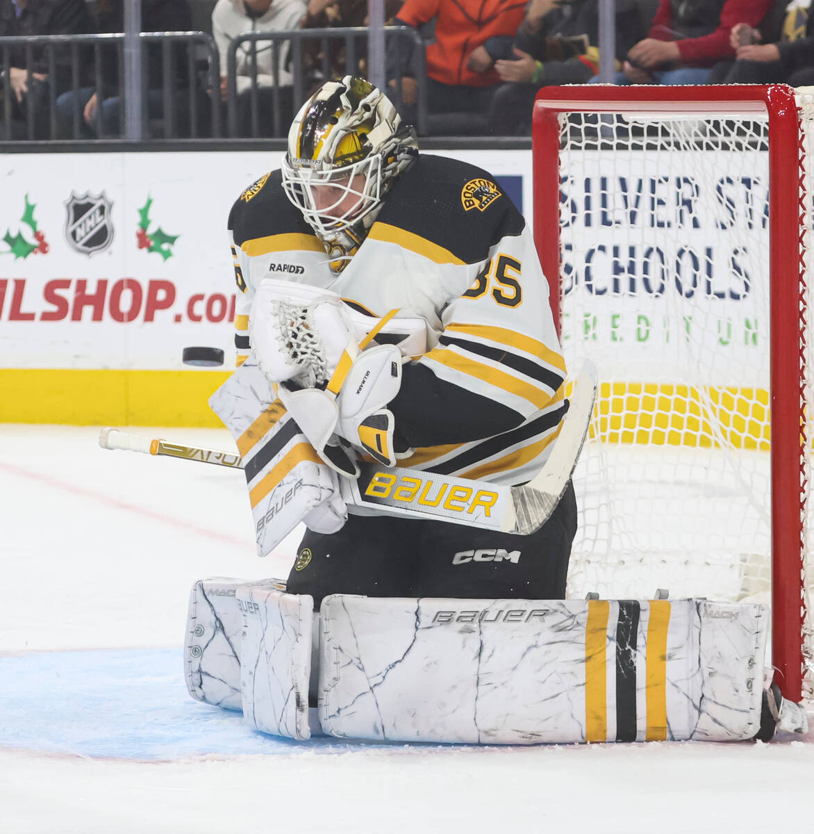 Boston Bruins goaltender Linus Ullmark (35) blocks a shot from the Golden Knights during the fi ...