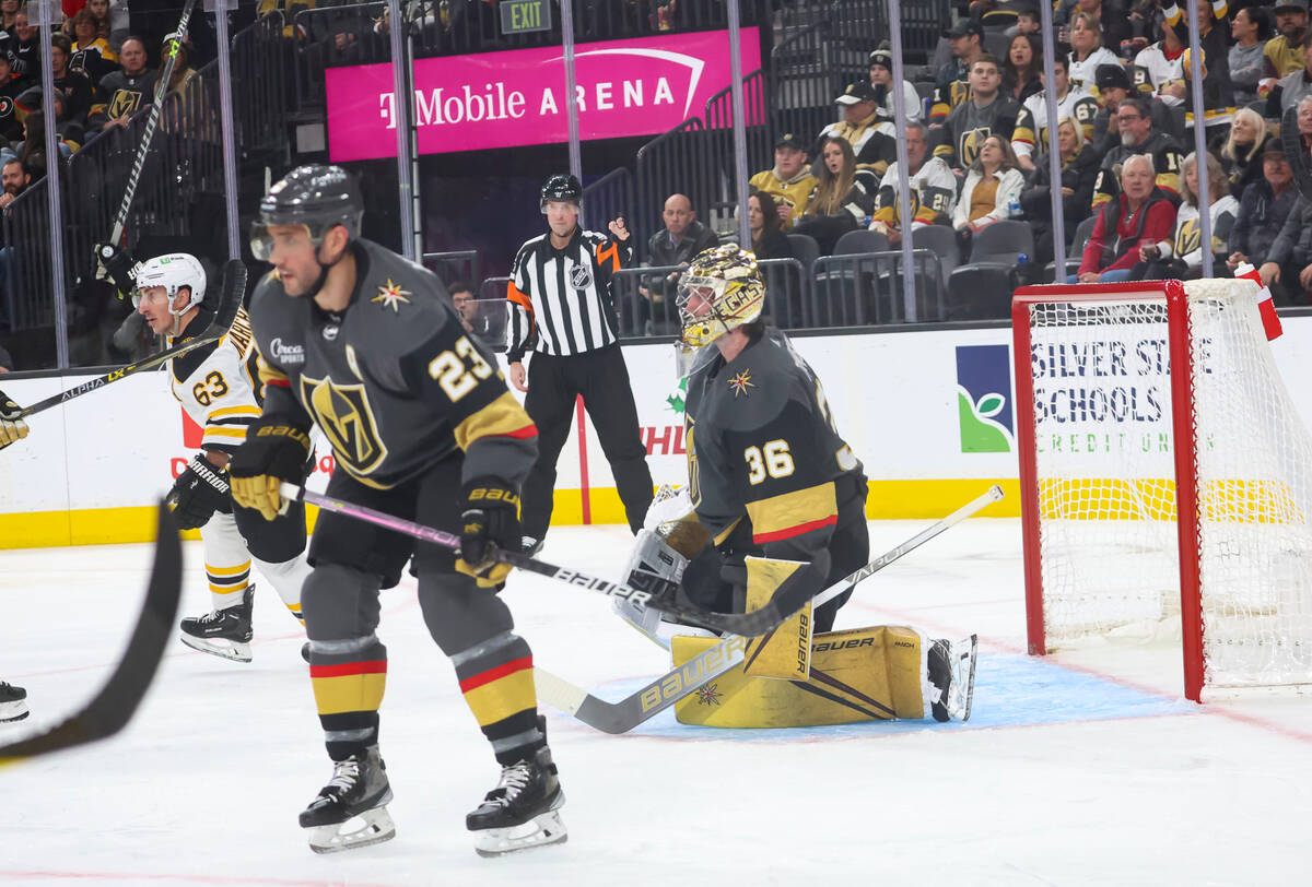 Golden Knights goaltender Logan Thompson (36) gives up a goal to the Boston Bruins during the s ...