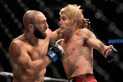 Jared Gordon, left, hits Paddy Pimblett during a UFC 282 mixed martial arts lightweight bout Sa ...