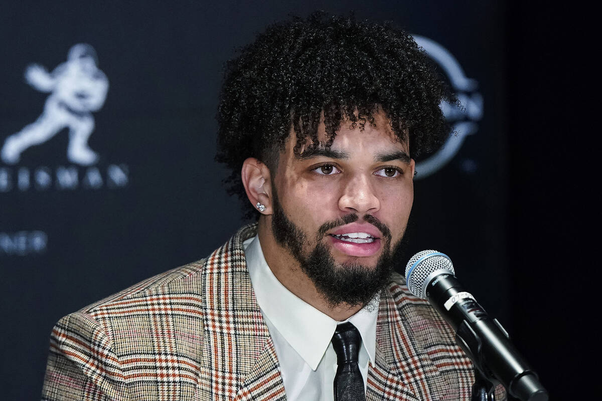 Heisman Trophy finalist and Southern California quarterback Caleb Williams speaks before attend ...