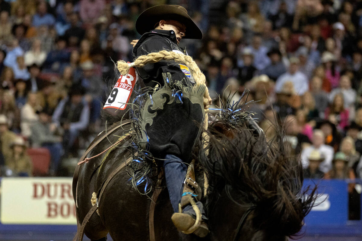 Zeke Thurston, of Big Valley, Alberta, Canada, competes in saddle bronc riding during the eight ...