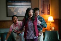 This image released by A24 Films shows, from left, Stephanie Hsu, Michelle Yeoh and Ke Huy Quan ...