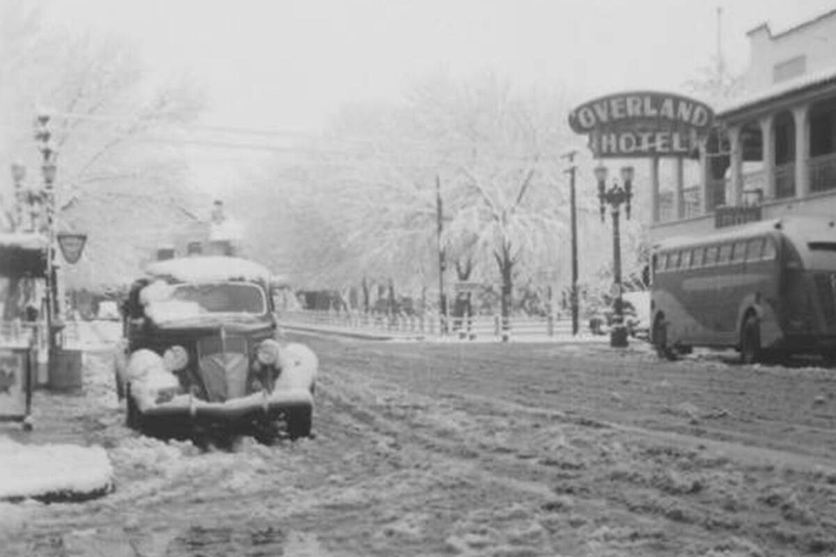 Cars covered in snow on Fremont Street in the 1930s. (Harold Stocker Collection, UNLV Special C ...