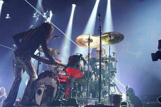 John Douglas is shown performing with Steven Tyler during Aerosmith's "Deuces Are Wild" residen ...
