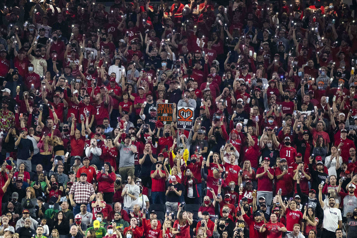 Utah Utes fans cheer their team during the first half of the Pac-12 championship football game ...