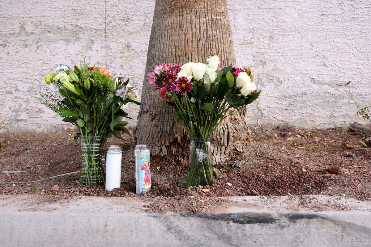 A makeshift memorial at the site of a deadly crash in the 5000 block of North Scott Robinson Dr ...