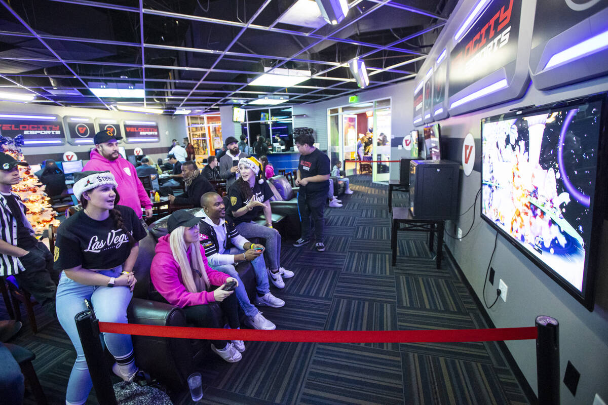 Members of esports team Las Vegas Inferno play Super Smash Bros. Ultimate during a party at Vel ...