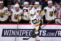 Vegas Golden Knights' Daniil Miromanov (42) celebrates his goal against the Winnipeg Jets with ...