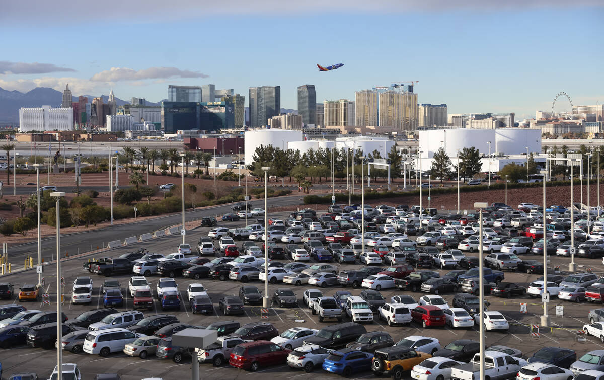 An airport staff parking lot is seen just north of the Terminal 1 parking garage at Harry Reid ...