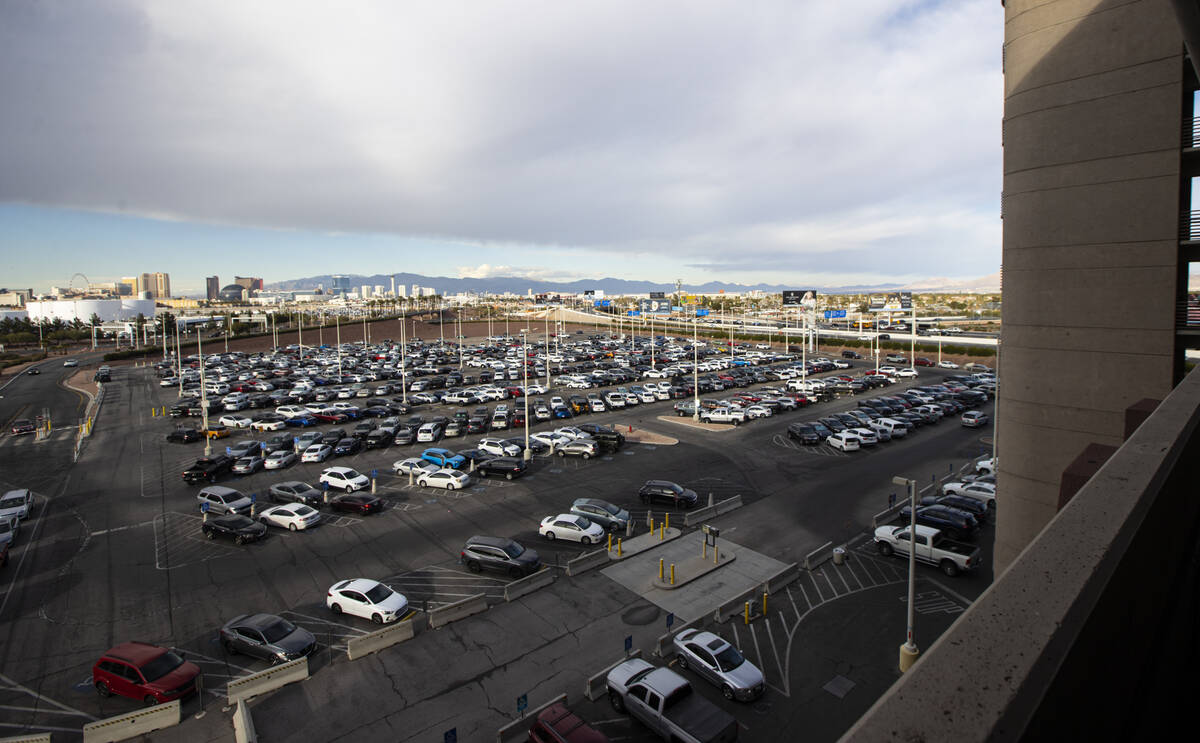 An airport staff parking lot is seen just north of the Terminal 1 parking garage at Harry Reid ...