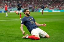France's Theo Hernandez, center, celebrates after scoring the opening goal during the World Cup ...